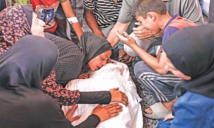 77 شهيدا بينهم 25 من طالبي المساعدات في قطاع غزة في يوم واحد